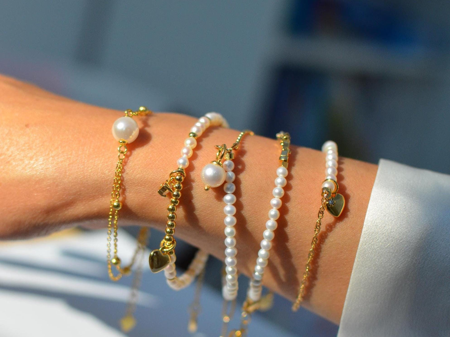 Elegant Pearl & Gold Chain Bracelets