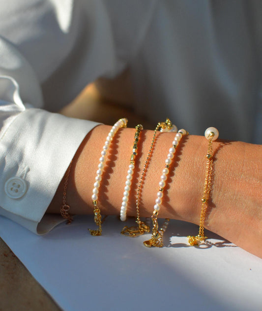 Elegant Pearl & Gold Chain Bracelets