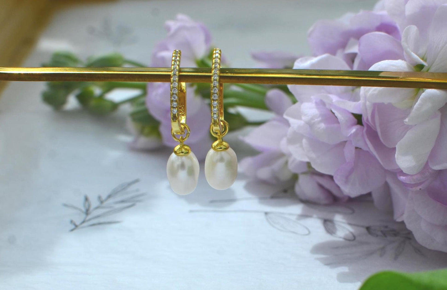 Gold Hoop Earrings with teardrop-shaped Freshwater Pearl Drop